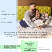 a man and woman reading a book on a bed
