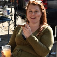 a woman wearing a green shirt