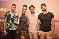 a group of people standing next to each other at an event
