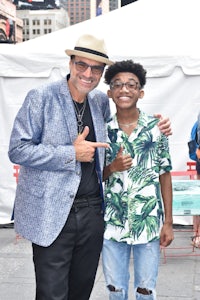 a man and a boy posing for a picture