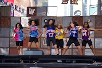 a group of dancers on a stage